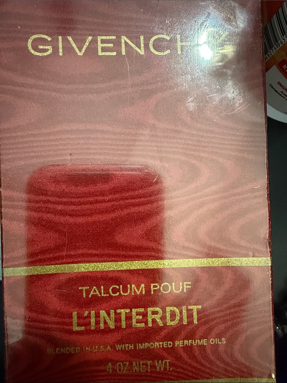 Vintage Givenchy L'Interdit Talcum Pouf, likely from the 1980s.